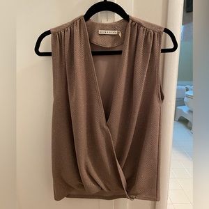 Alice & Olivia women’s gold v-neck top.